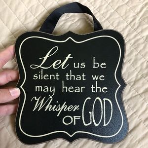 Hanging Whisper of God sign